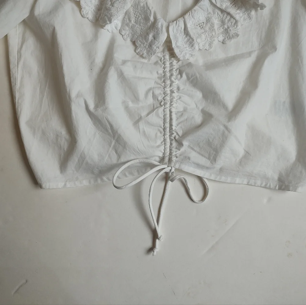Maeve White Ruffled V-Neck Drawstring Blouse